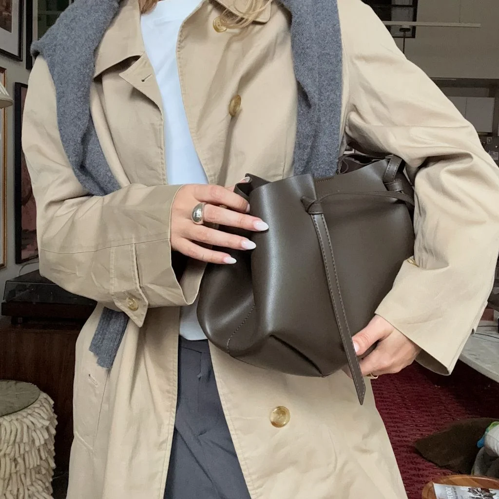 The trench coat and straight-leg jeans combo