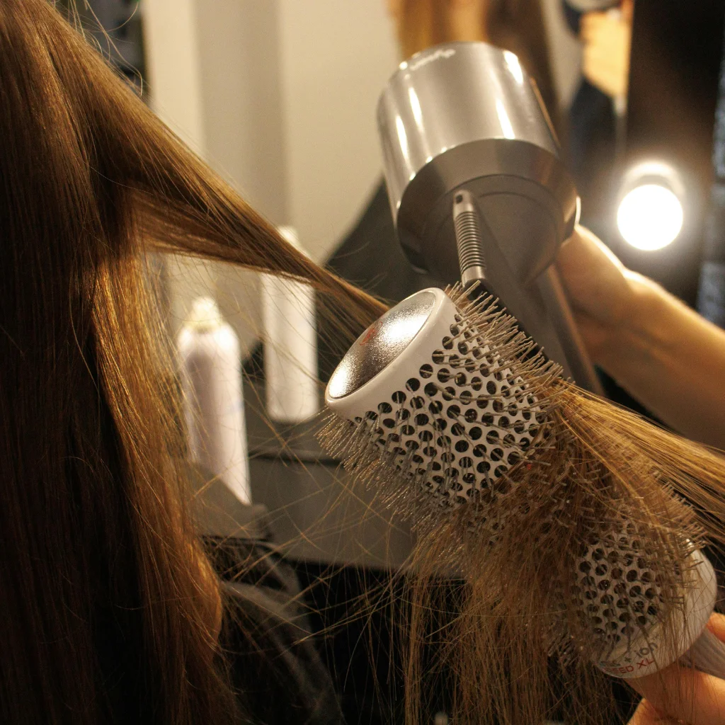 hair styling tools flat lay brush dryer