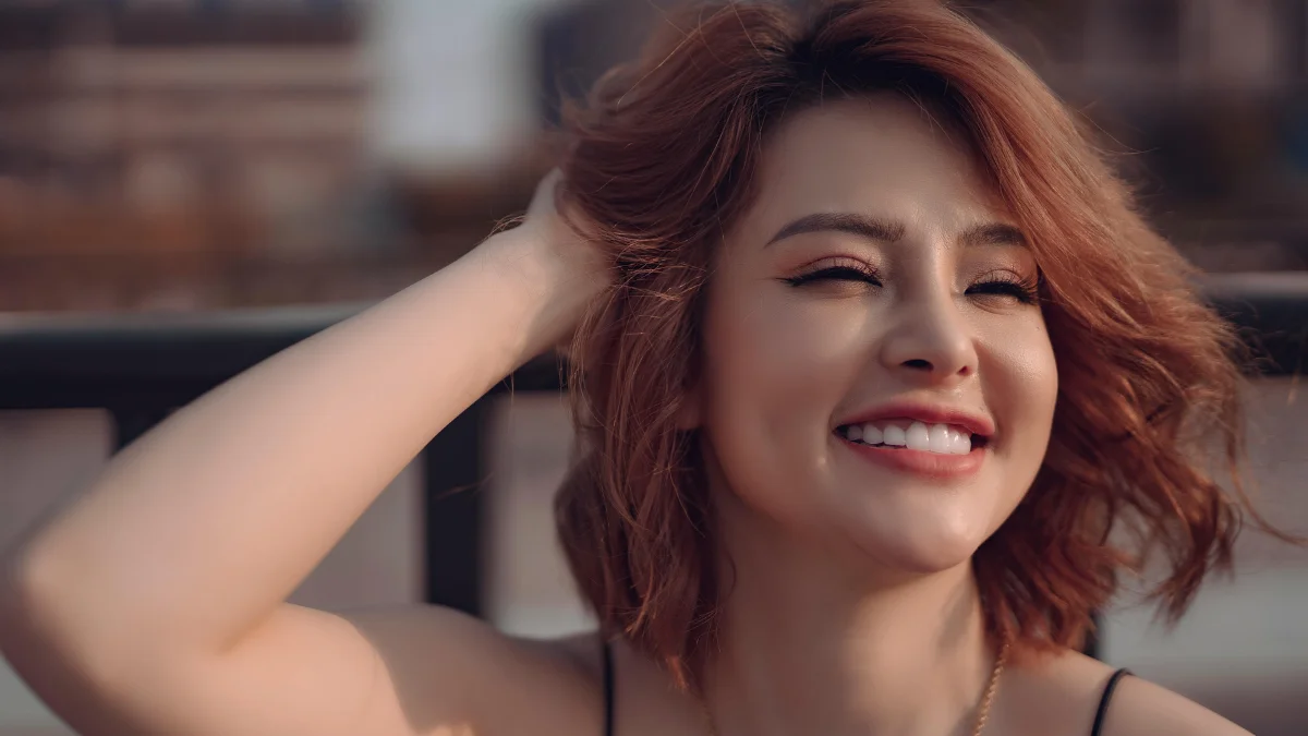 layered bob hairstyle woman soft waves