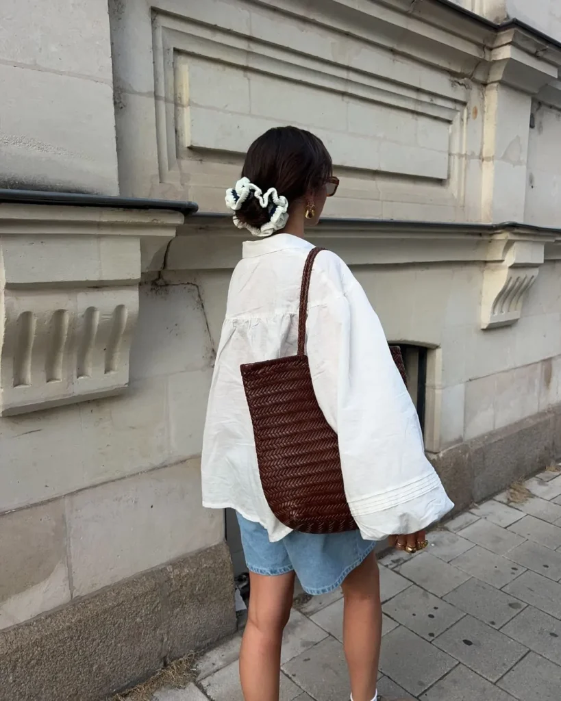 white shirt dark denim shorts loafers  