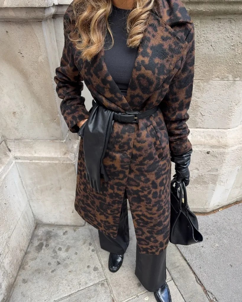 woman leopard print coat black dress