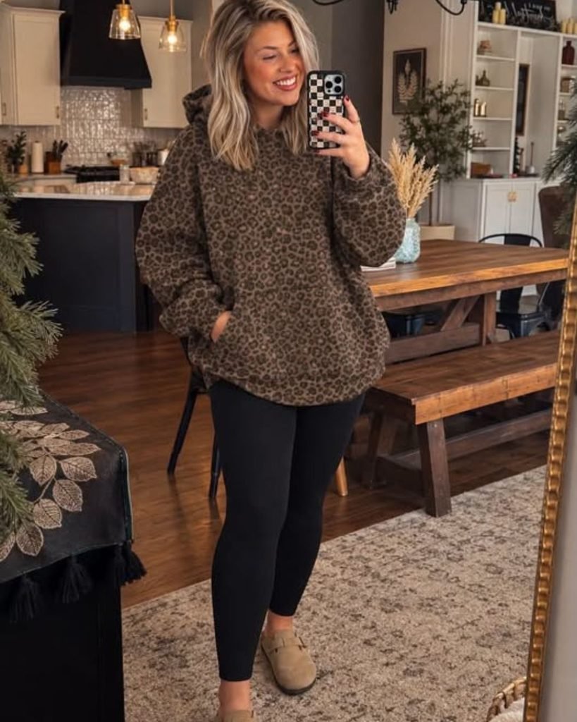 woman oversized animal print sweater leggings