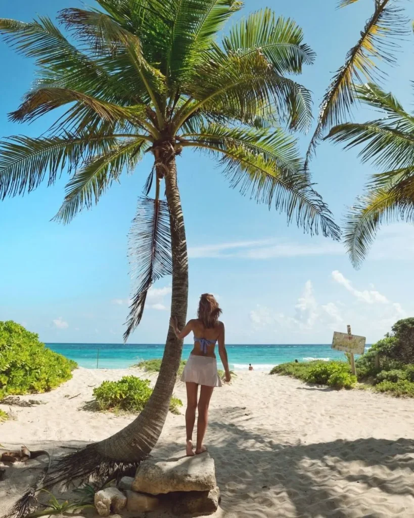 woman relaxing sun lounger ocean